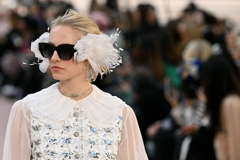 A model presents a creation by Chanel for the Women Ready-to-wear Spring-Summer 2025 collection as part of the Paris Fashion Week, in Paris on 1 October, 2024.