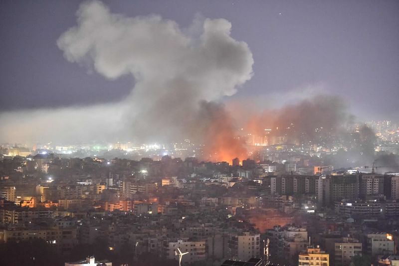 Smoke rises from the site of an Israeli airstrike that targeted a neighborhood in Beirut’s southern suburb on 3 October 2024. The Israeli military issued orders in the early hours of 3 October, telling people to leave multiple areas of densely-populated southern Beirut, where it says it will hit Hezbollah sites