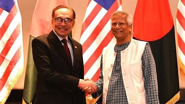 Bangladesh interim government chief adviser professor Dr. Muhammad Yunus and Malaysian prime minister Anwar Ibrahim in Dhaka on 4 October 2024