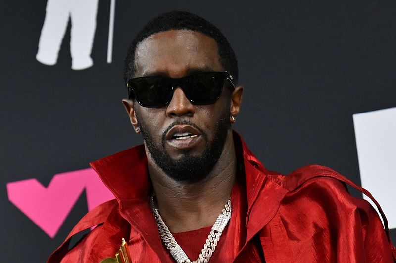 US producer-musician Sean 'Diddy' Combs poses with the Global Icon award in the press room during the MTV Video Music Awards at the Prudential Center in Newark, New Jersey, on 12 September, 2023.