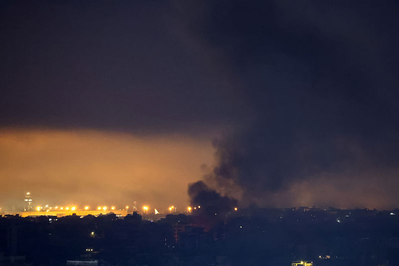 Smoke billows over Beirut southern suburbs after a strike, amid the ongoing hostilities between Hezbollah and Israeli forces, as seen from Sin El Fil, Lebanon on 8 October 2024