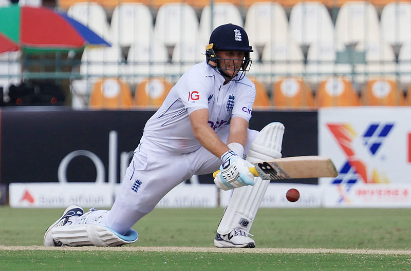 England’s Joe Root plays a reverse sweep in the first test against Pakistan at Multan Cricket Stadium, Multan, Pakistan on 9 October 2024