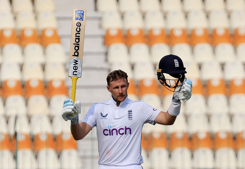 England’s Joe Root celebrates after reaching his century in the first test against Pakistan at Multan Cricket Stadium, Multan, Pakistan on 9 October 2024