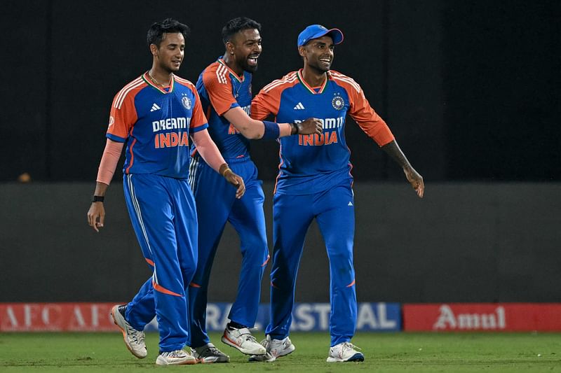 India’s Hardik Pandya (C) celebrates with teammates after taking a catch to dismiss Bangladesh’s Rishad Hossain during the second Twenty20 international cricket match between India and Bangladesh at the Arun Jaitley Stadium in New Delhi on 9 October 2024