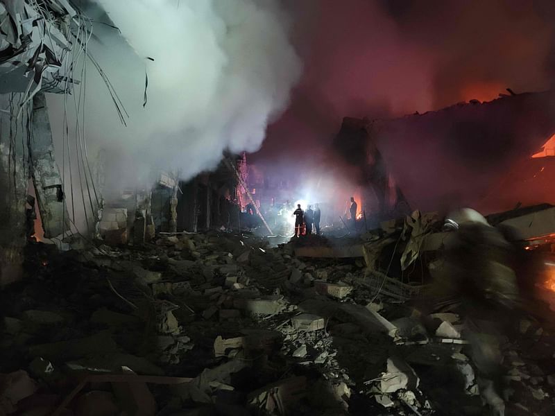 Rescuer search for survivors at the site of an Israeli airstrike that targeted the southern Lebanese city of Nabatiyeh on 12 October, 2024.