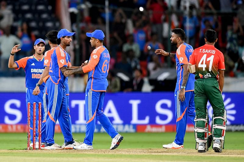 India’s captain Suryakumar Yadav (3R) celebrates with teammates after their victory against Bangladesh at their third and final Twenty20 international cricket match in the Rajiv Gandhi International Stadium of Hyderabad on 12 October 2024