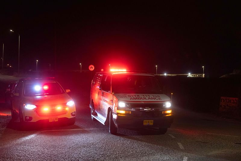 An ambulance leaves the scene of a drone strike near the northern Israeli town of Binyamina, on October 13, 2024, amid the continuing war between Israel and Hezbollah.