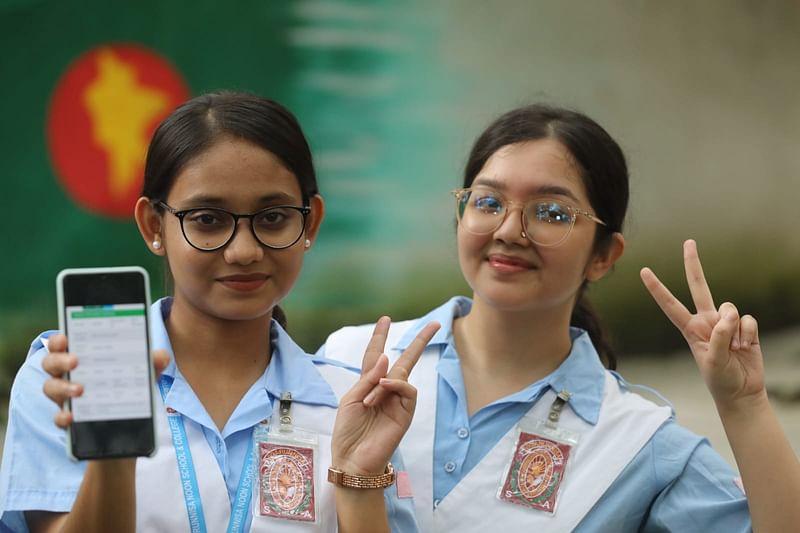 Two students of Viqarunnisa Noon School celebrate HSC results on 15 October