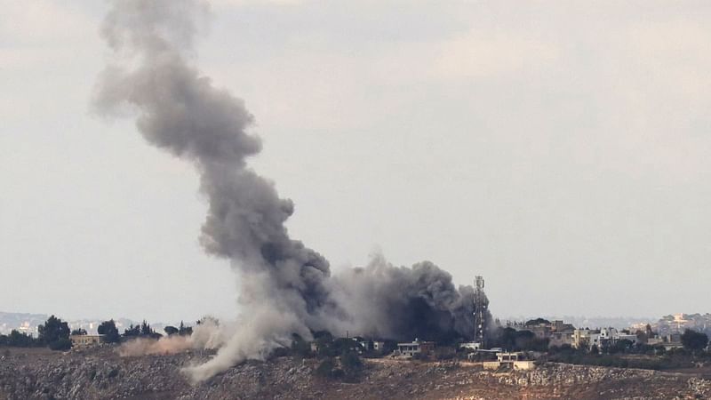 Smoke rises from the site of an Israeli airstrike on the southern Lebanese village of Arnoun on 17 October, 2024, amid the continuing war between Hezbollah and Israel