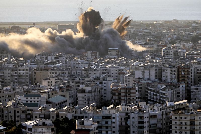 A cloud of smoke erupts following an Israeli airstrike on Beirut's southern suburbs on October 19, 2024. Israel expanded operations in Lebanon nearly a year after Hezbollah began exchanging fire in support of its ally, Hamas, following the Palestinian group's deadly attack on Israel on October 7, 2023