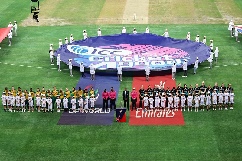 South Africa (L) and New Zealand players line up for their national anthems before the start of the ICC Women's T20 World Cup cricket final match between South Africa and New Zealand at the Dubai International Cricket Stadium in Dubai on October 20, 2024.