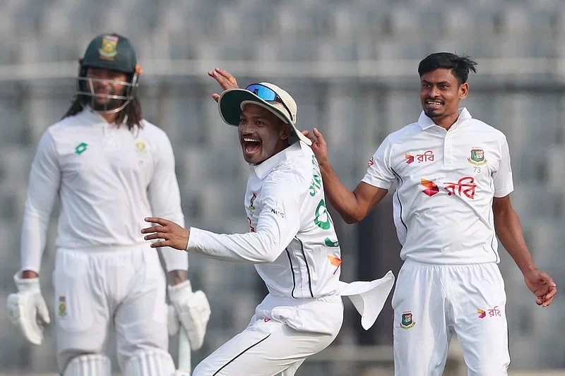 Bangladesh skipper Najmul Hossain Shanto (M) elated as Taijul picks up the wicket of South Africa batter Beddingham in the first Test at Mirpur on 21 October 2024