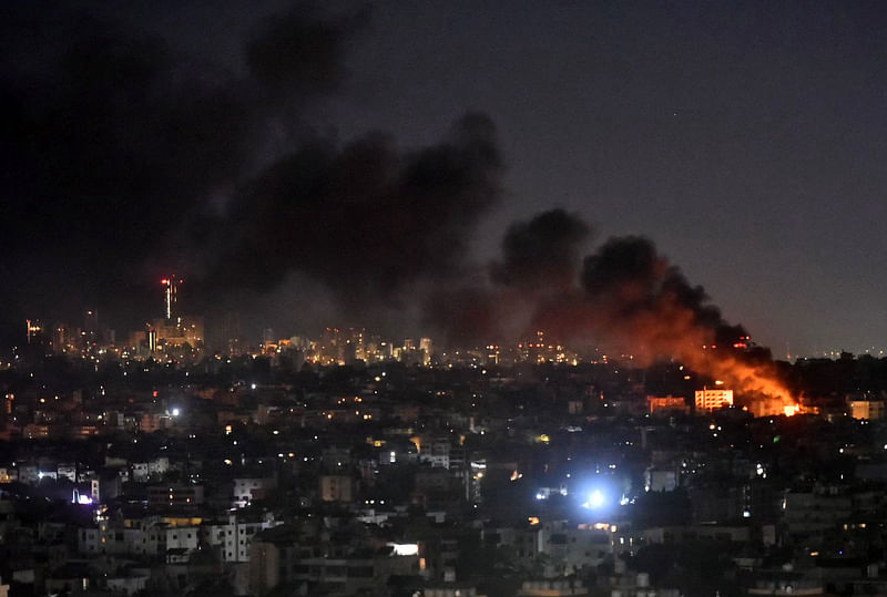 Smoke and flames rise from areas targeted by an Israeli airstrike in Beirut’s southern suburbs late on 20 October, 2024.