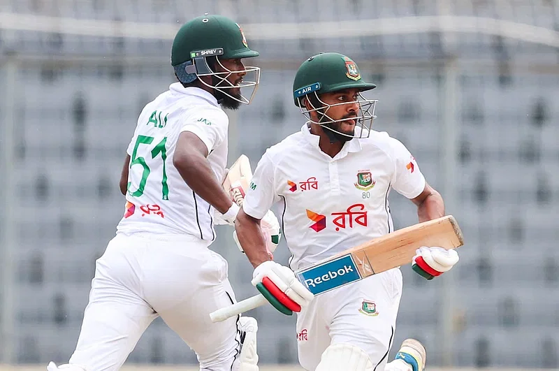 Mehidy Hasan Miraz and debutant Jaker Ali sprinting for a run in the second innings of the first Test against visiting South Africa at Sher-e-Bangla National Cricket Stadium in Mirpur, Dhaka on 23 October 2024