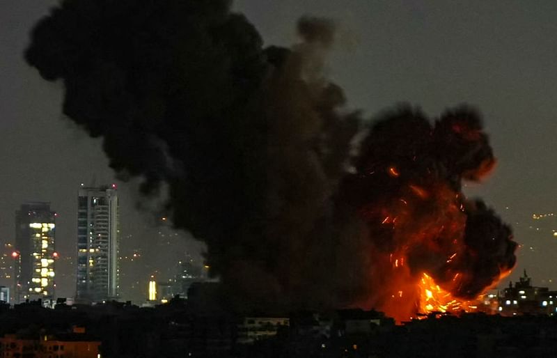 Smoke rises from the site of an Israeli airstrike that targeted a residential complex in the Leylaki neighbourhood in Beirut’s southern suburbs on 23 October 2024