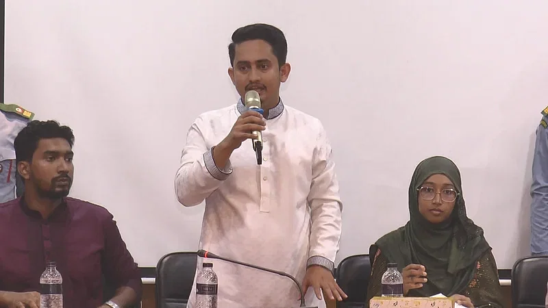 Central coordinator of Students Against Discrimination Sarjis Alam speaks at a gathering of students, who participated in the movement, at the Madaripur pourashava auditorium on 25 October 2024