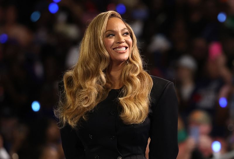 Beyoncé looks on during a campaign rally with Democratic presidential candidate, US Vice President Kamala Harris, at Shell Energy Stadium on 25 October, 2024 in Houston, Texas. Vice President Kamala Harris is campaigning in Texas holding a rally supporting reproductive rights with recording artists Beyoncé and Willie Nelson.