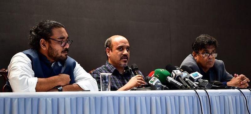 Chief adviser’s deputy press secretary Abul Kalam Azad Majumder and press secretary Shafiqul Alam addressing a press conference  at the Foreign Service Academy in the capital this evening