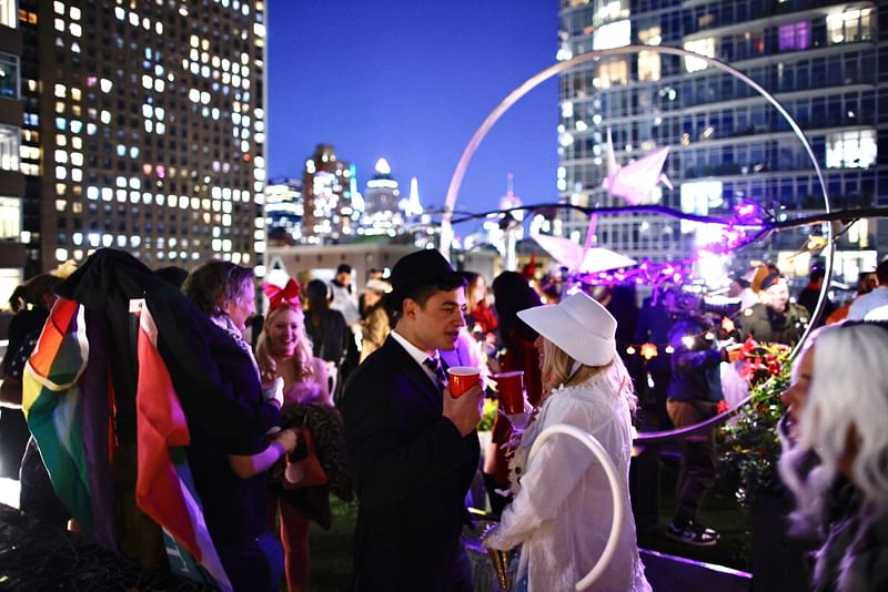 People attend New York Young Republican Club's 6th annual rooftop MAGAWEEN party in New York, October 26, 2024