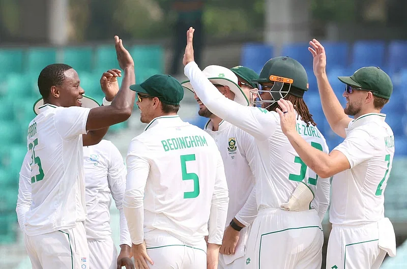 South African players celebrate on the field.