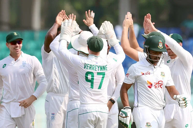 Najmul Hossain Shanto returning from the crease.