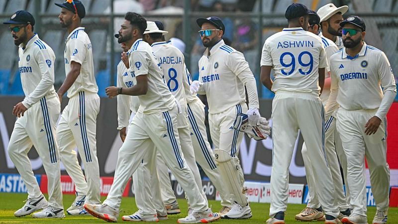 India's players arrive on field at the start of play on the first day of the third Test cricket match between India and New Zealand at the Wankhede stadium in Mumbai on 1 November, 2024