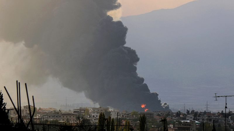 Smoke rises from the site of an Israeli airstrike that targeted Lebanon's eastern city of Baalbek, in the Bekaa valley on 30 October 2024.