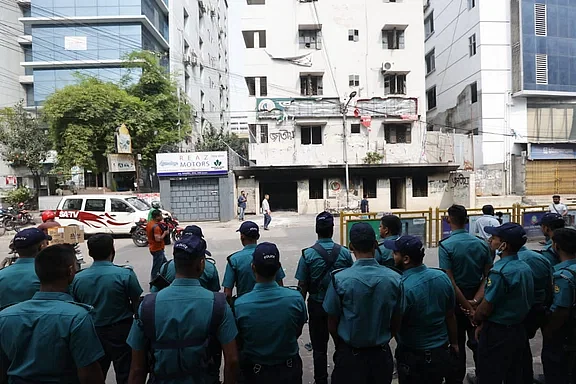 The policemen on alert in front of the Jatiya Party office in Dhaka on 2 November 2024.