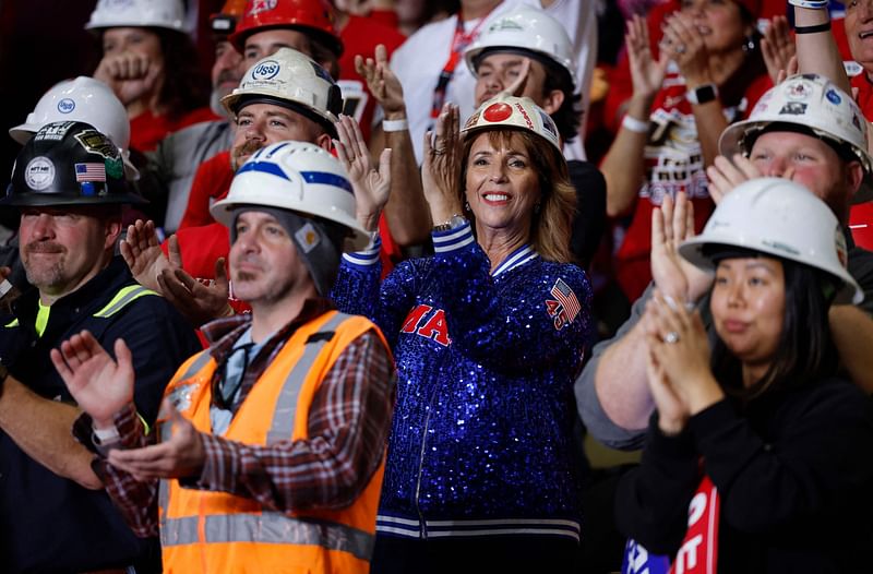 Supporters in hard hats cheer for Republican presidential nominee, former President Donald Trump during a campaign rally at PPG Paints Arena on November 04, 2024 in Pittsburgh, Pennsylvania