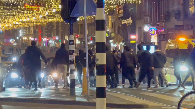 Israeli football supporters and Dutch youth clash near Amsterdam Central station, in Amsterdam, Netherlands, 8 November 2024, in this still image obtained from a social media video.