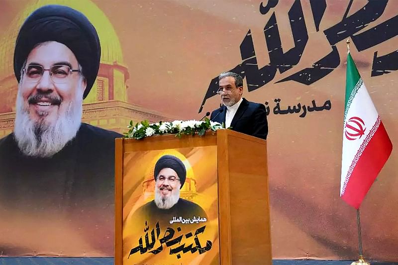 This handout picture provided by the Iranian foreign ministry shows Iran's Foreign Minister Abbas Araghchi speaking during ceremony in tribute to slain Hezbollah leader Hasan Nasrallah in Tehran on 9 November 2024 .