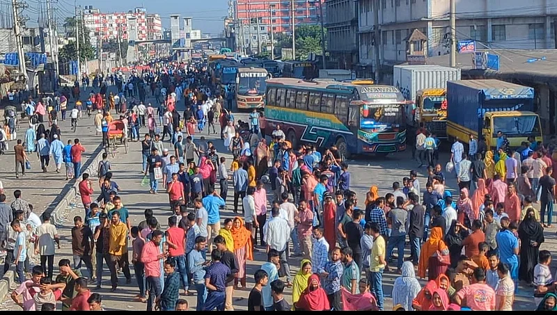 Workers of TNZ Apparels factory demonstrate blocking the Dhaka-Mymensingh highway in Gazipur for the third consecutive day demanding arrears. Photo taken from Maleker Bari area in the city on 11 November 2024.