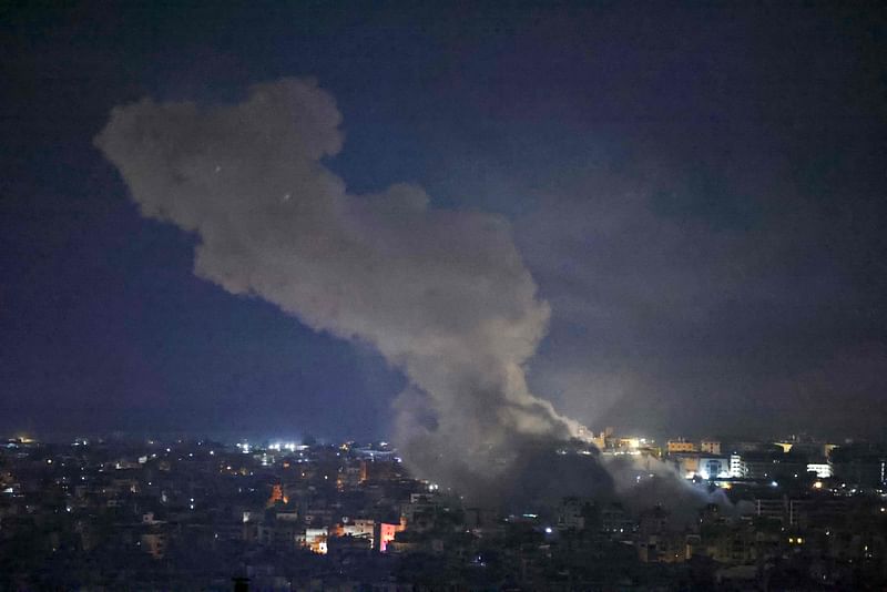 Smoke rises from the site of an Israeli airstrike targeting a neighborhood in southern Beirut on 13 November, 2024, amid the ongoing war between Israel and Hezbollah.