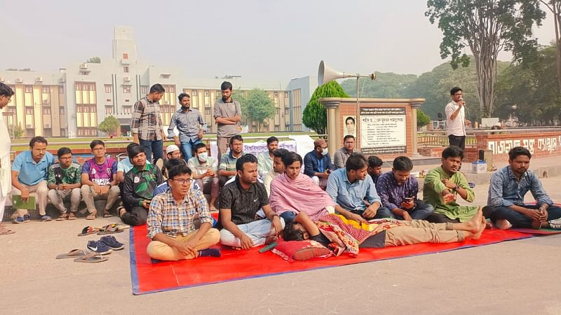 A group of students at Rajshahi University (RU) go on a fast unto death at the Shahid Dr Shamsuzzoha Chattar on the campus.