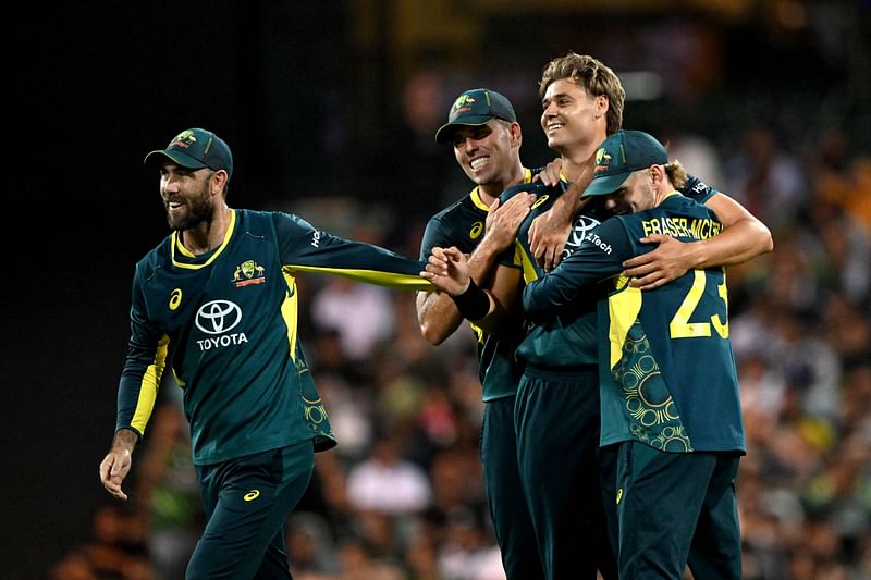 Australia’s Spencer Johnson (2nd R) celebrates with teammates after dismissing Pakistan's Abbas Afridi during the second Twenty20 international cricket match between Australia and Pakistan at the Sydney Cricket Ground (SCG) in Sydney on November 16, 2024.