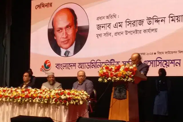 The principal secretary to the chief adviser's office, M Siraj Uddin Mia, delivers a speech at a seminar titled 'Administrative Reform and Development: Current Context and Future Perspectives' in Dhaka on 16 November.