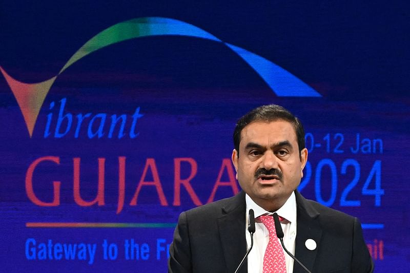 Chairperson of Indian conglomerate Adani Group, Gautam Adani addresses a gathering during the inaugural session of Vibrant Gujarat Global Summit 2024 in Gandhinagar on 10 January 2024