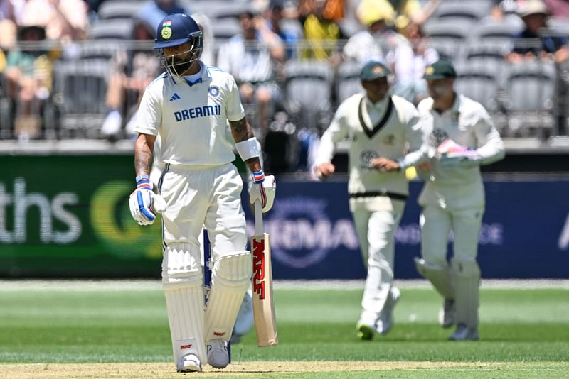 India's Virat Kohli walks back to the pavilion after his dismissal by Australia’s paceman Josh Hazlewood during the first day of the third first Test cricket match between Australia and India at the Optus Stadium in Perth on 22 November, 2024