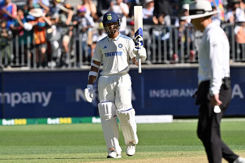 India’s Yashasvi Jaiswal celebrates reaching his half century (50 runs) during the second day of the first Test cricket match between Australia and India at the Optus Stadium in Perth on November 23, 2024