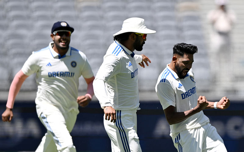 India’s Mohammed Siraj celebrates the wicket of Australia’s Usman Khawaja in the First Test at Optus Stadium, Perth, Australia on 25 November 2024