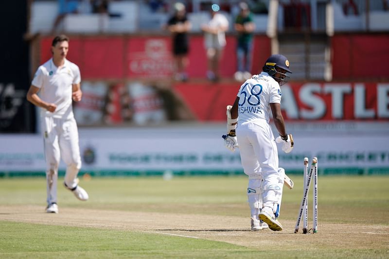 Sri Lanka's Vishwa Fernando is bowled by South Africa's Marco Jansen during the second day of the first Test cricket match between South Africa and Sri Lanka at the Kingsmead stadium in Durban on 28 November, 2024.