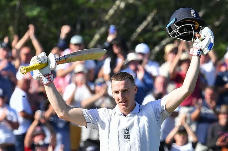 England’s Harry Brook celebrates his century (hundred runs) during the second day of the first Test cricket match between New Zealand and England at Hagley Oval in Christchurch on 29 November 2024