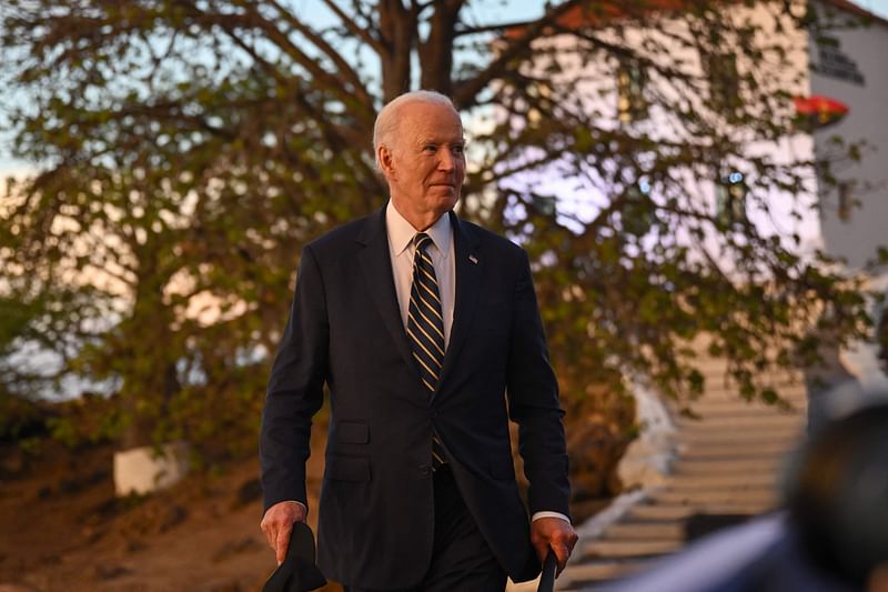 US President Joe Biden leaves after visiting the National Slavery Museum in Morro da Cruz, near Luanda, on 3 December 2024.