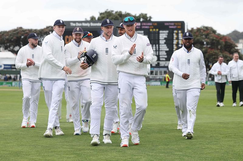 England's captain Ben Stokes leads his team from the field after their match and series win during day three of the second Cricket Test match between New Zealand and England at Basin Reserve in Wellington on 8 December, 2024.