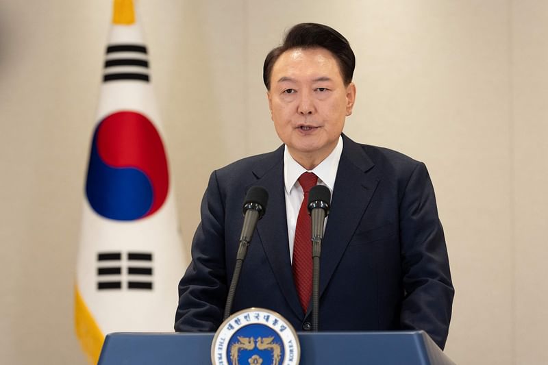 This handout photo taken on 12 December, 2024 and released by the South Korean Presidential Office shows South Korean President Yoon Suk Yeol delivering an address at the Presidential Office in Seoul.