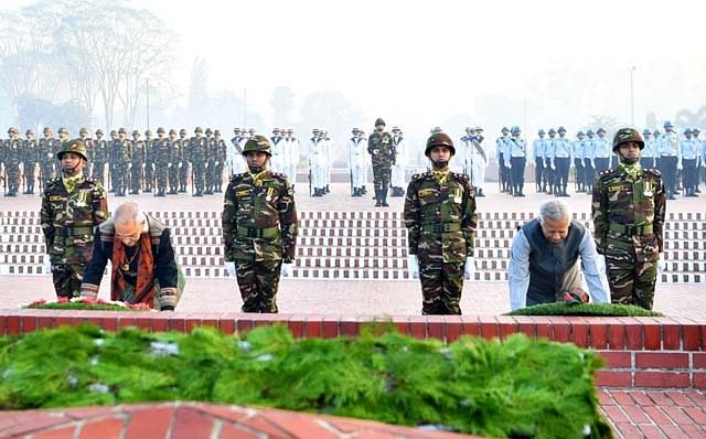 Chief Adviser Dr Muhammad Yunus (R) and President of Timor-Leste Jose Ramos-Horta pay rich tributes to the martyrs of the 1971 Liberation War by placing wreaths at the National Memorial in Savar on 16 December 2024