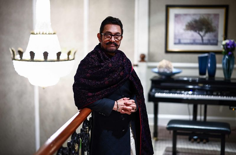 Indian actor Aamir Khan poses for a portrait inside a hotel during an interview with AFP in London on 3 December, 2024.