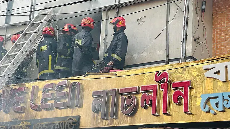 Fire service members working to extinguish fire at Love Leen Restaurant in Uttara on 20 December 2024.