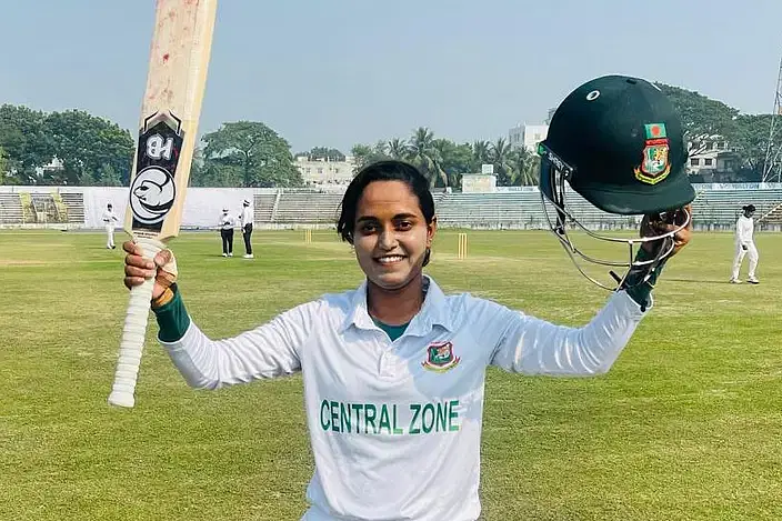 Nigar Sultana celebrates after scoring the maiden century in Women's First Class Cricket