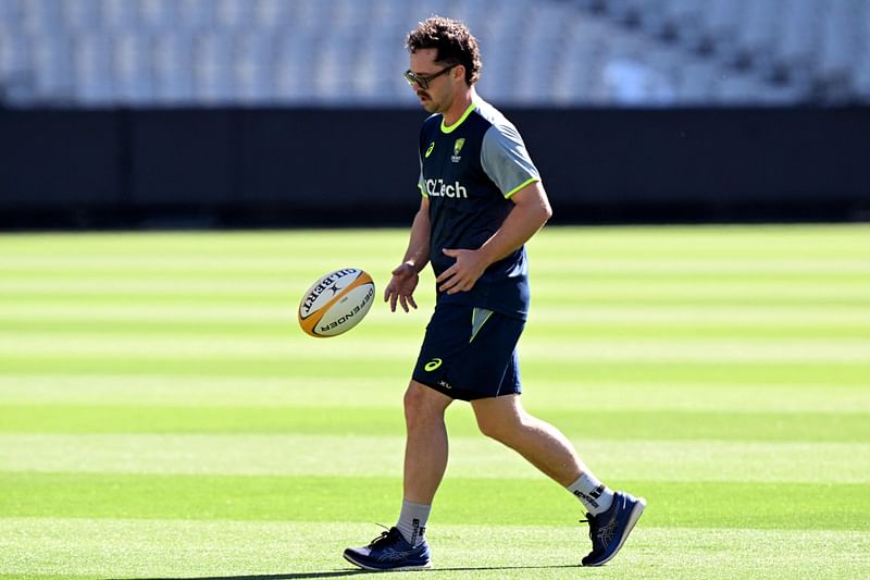 Australian batsman Travis Head bounces a football at the Melbourne Cricket Ground (MCG) in Melbourne on 25 December 2024, ahead of the fourth cricket Test match between Australia and India starting 26 December